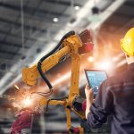 Foreman directs a robotic factory